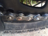 Close up of flared master link rivets