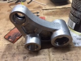 Uni-trak suspension arm cleaned up ready for new bearings