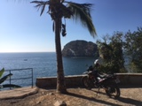 Overlooking ocean, large rock protruding