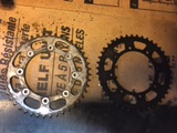 Old and new rear sprocket side by side.