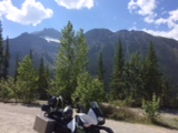 motorcycle in front of mountains
